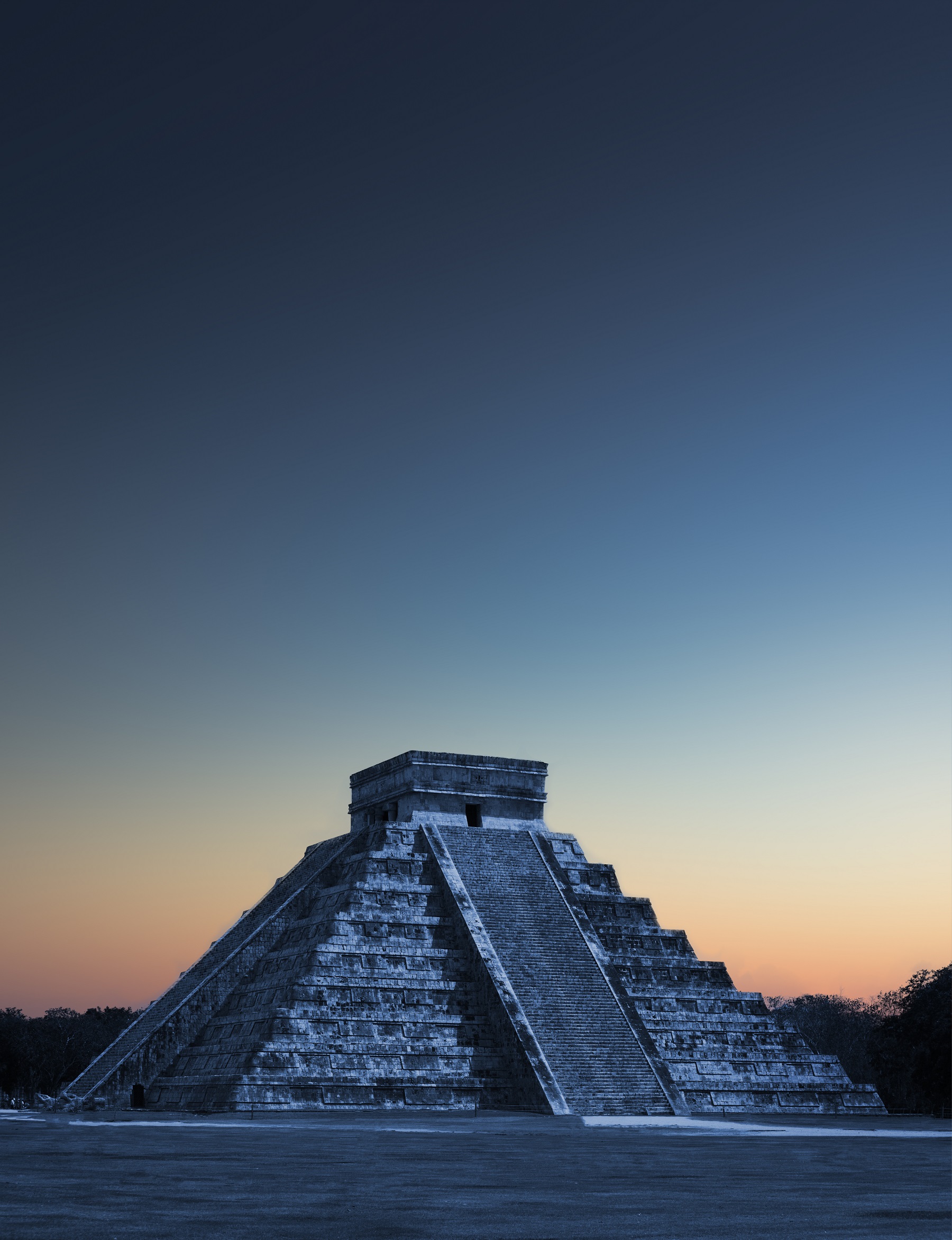 An image of the Step-Pyramid of El Castillo at Chichen Itza, the pyramid rises 79 feet (24 meters) above the main plaza. The pyramid has four sides, with 91 stairs each facing the cardinal directions. Shutterstock.