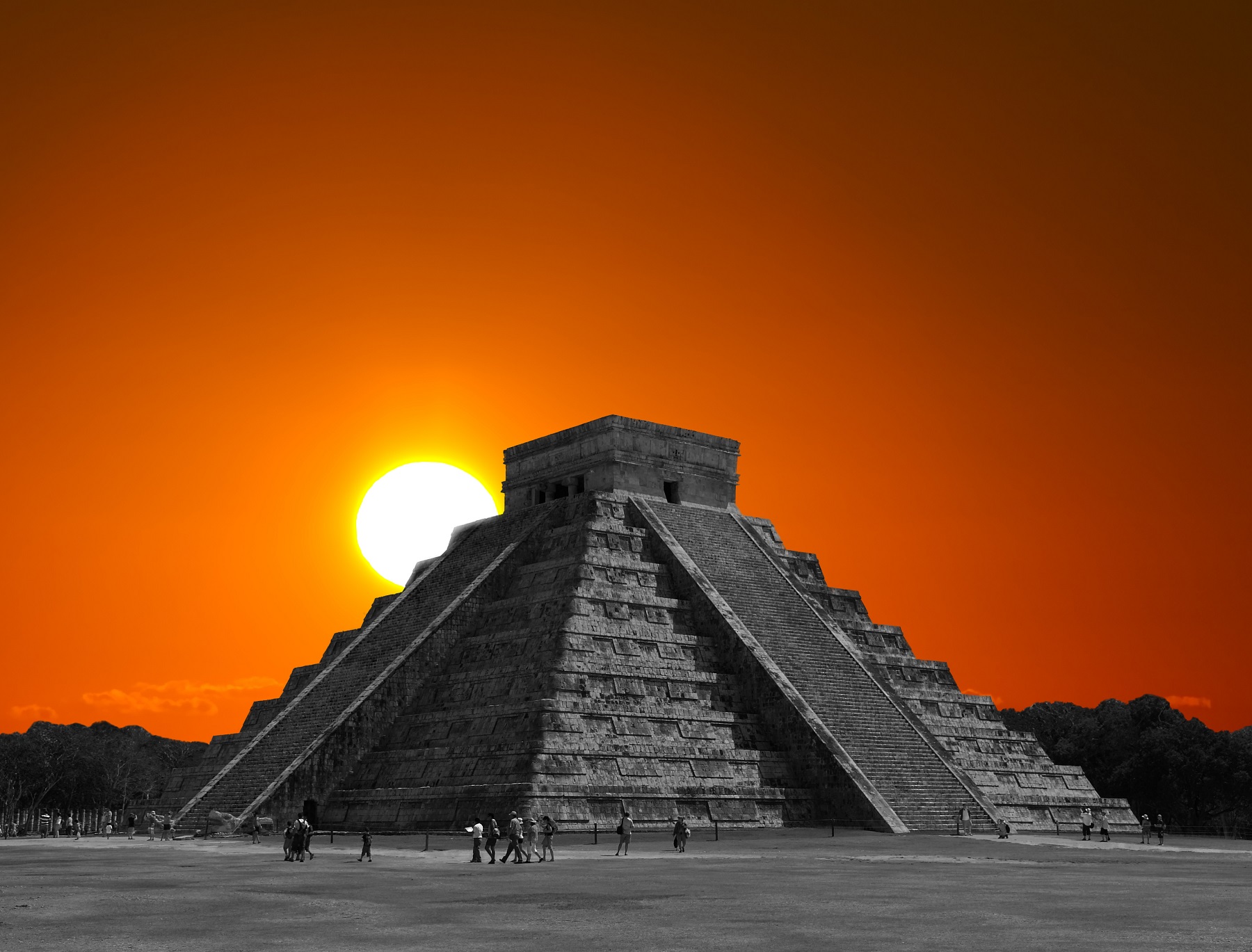 Sun-rising-behind-the-Pyramid-of-Chichen-Itza.jpg