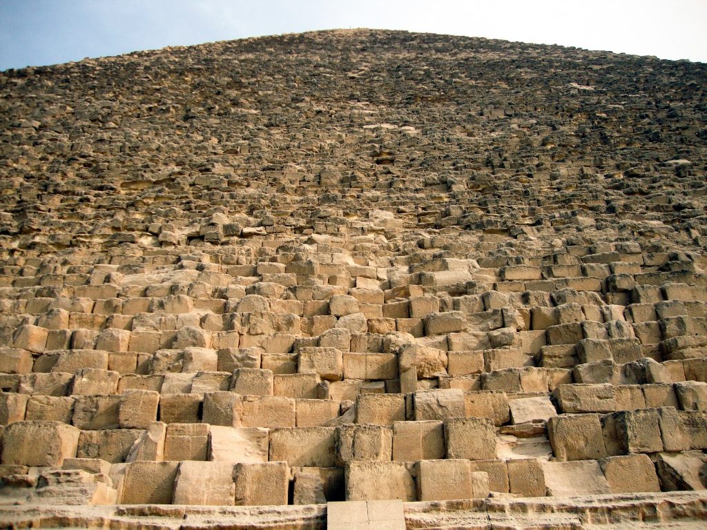 The stone-core of the Great Pyramid of Giza as seen from the ground. Shutterstock.